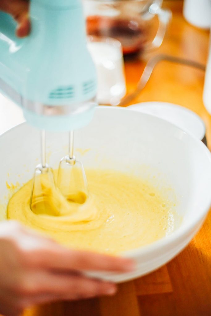 Mixing butter and sugar to make chocolate cake