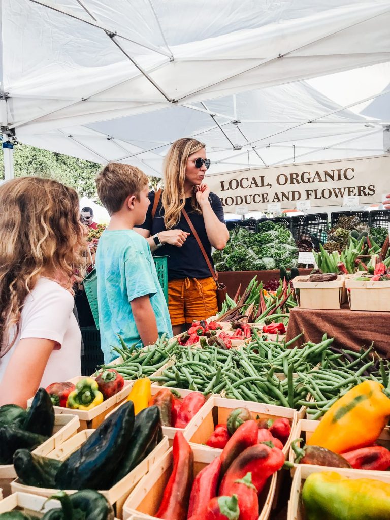 Farmer's market shopping for tomatoes