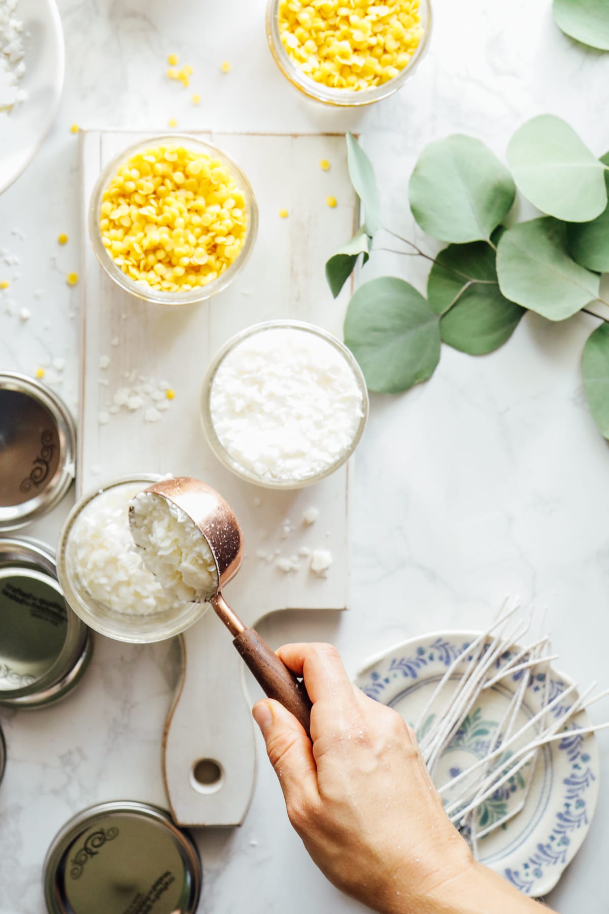 adding beeswax to jars to make your own candles