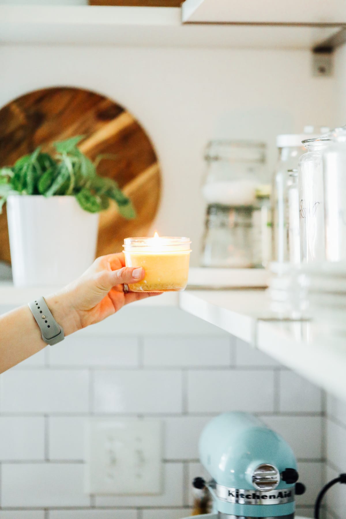 homemade candle on a shelf