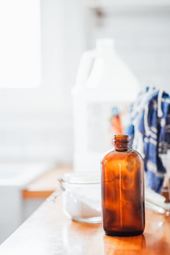 vinegar and spray bottle on kitchen counter