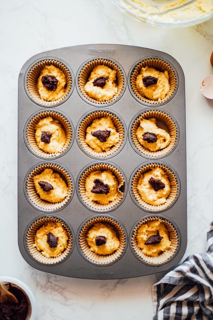 einkorn muffin batter with cinnamon swirl top