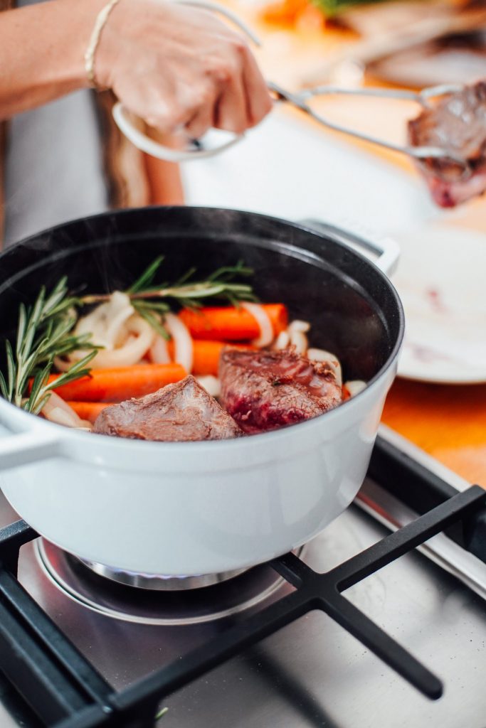 short ribs and vegetables in a dutch oven