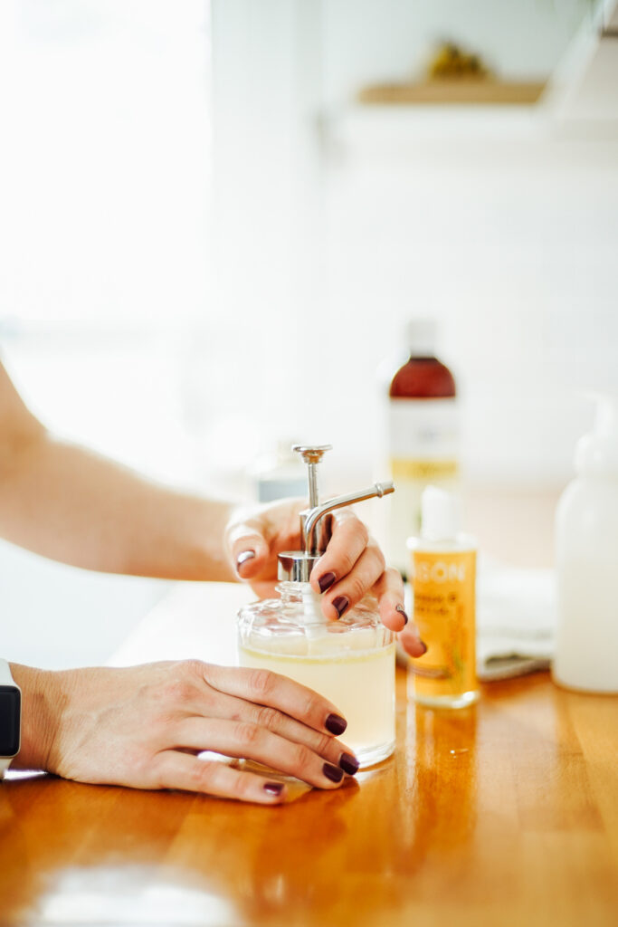 Homemade face wash made with castile soap in a glass bottle.