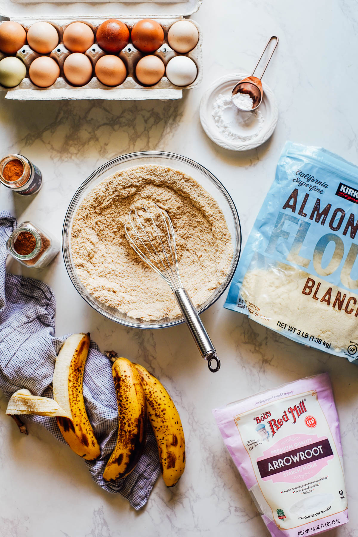 Ingredients needed to make banana muffins: almond flour, arrowroot starch, eggs, bananas.