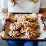 Einkorn Oatmeal Cookies on a sheet pan fresh out of the oven.