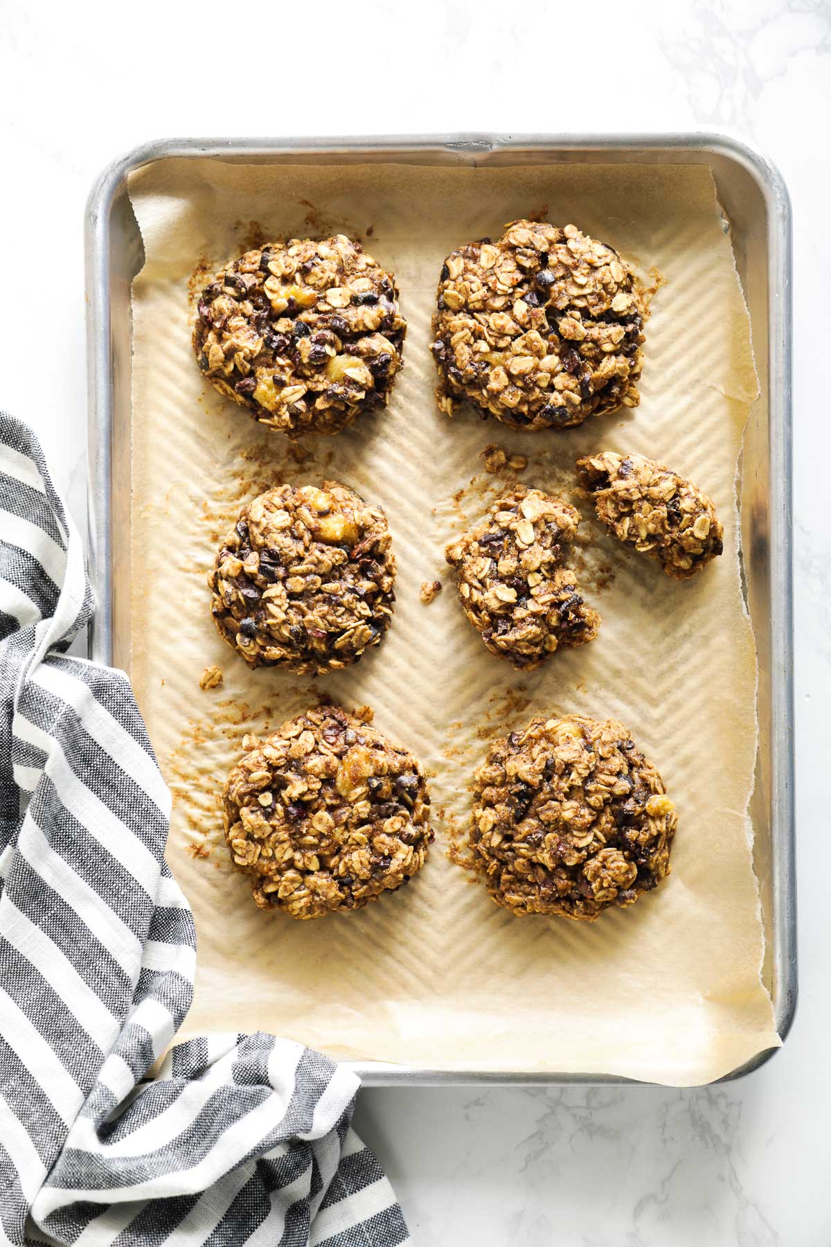 Breakfast cookies on a sheet pan, after baking.