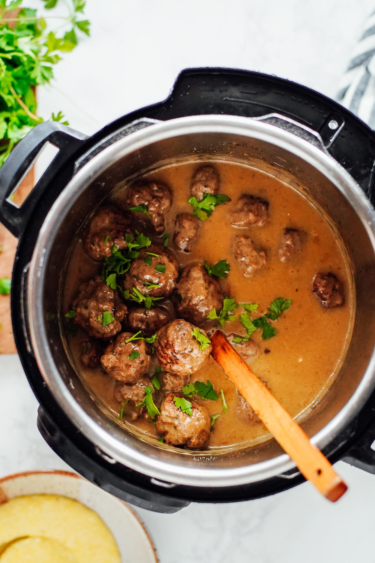 Cooked Swedish meatballs in a gravy sauce in the Instant Pot.