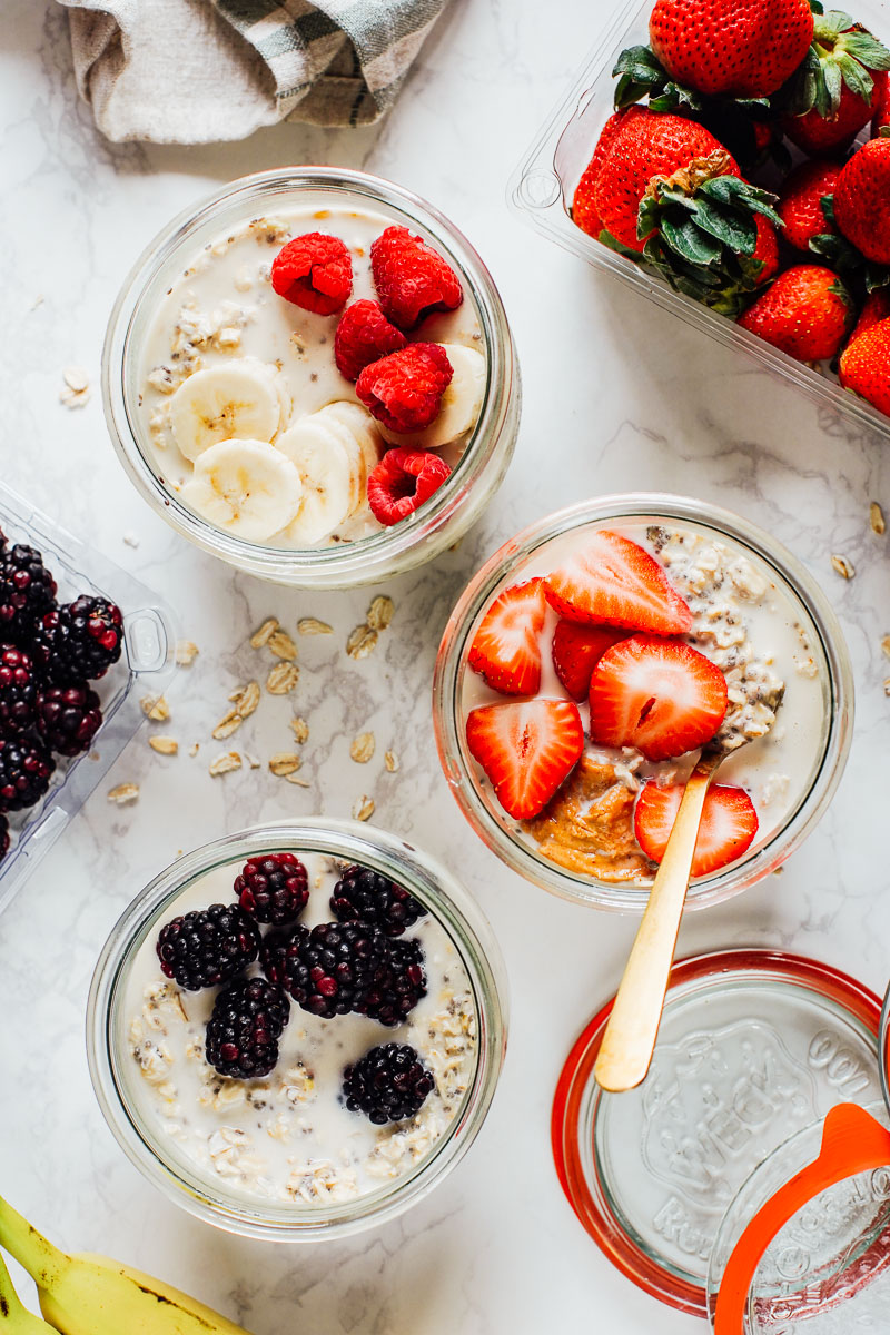 Overnight oats on the counter with berries on top.